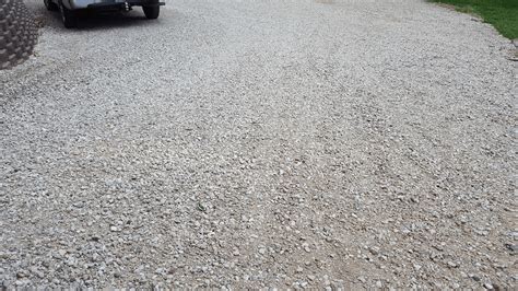 Gravel Driveway Maintenance - Guy on a Tractor - Wamego, KS