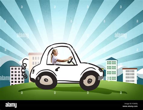 Young girl driving drawn little funny car Stock Photo - Alamy