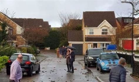 Surrey tornado: Residents SHOCK as tiles stripped from homes in leafy ...