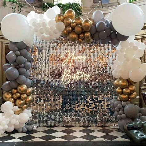 Create an elegant atmosphere for a birthday party with our grey and golden theme with silver ...