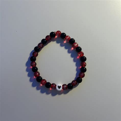 Black and Red Bracelet -size 2 1/2- -made with... - Depop