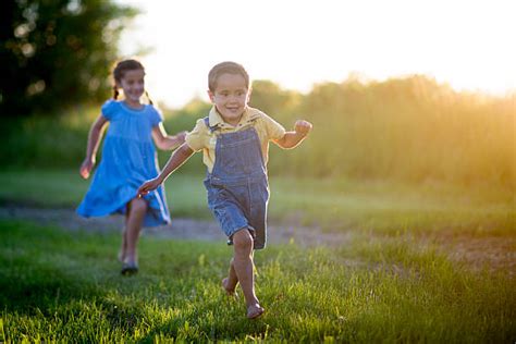 Kids Playing Tag Stock Photos, Pictures & Royalty-Free Images - iStock