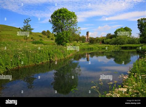 The fishpond and ruins of St Martin's Church at Wharram Percy, deserted ...