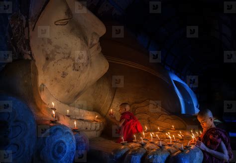 Mini Monk in meditation inside temple stock photo (147361) - YouWorkForThem