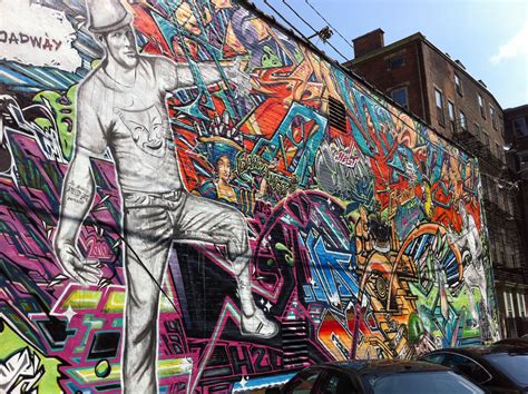 "In the Know" outside of it technically. One of #Cincinnati's many murals. - via @prblog ...