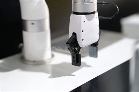 Mechanical Arm of Robotic Arm in Production Closeup Stock Image - Image of cybernetics ...