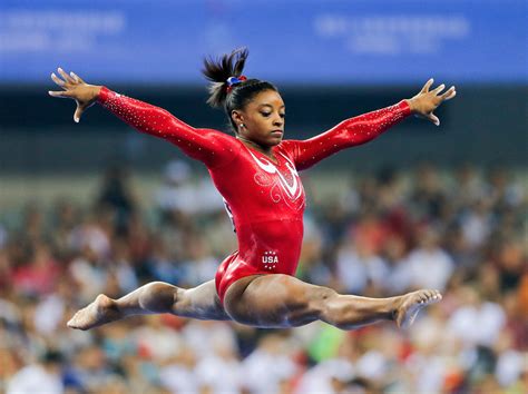 Not My Job: We Quiz Gymnast Simone Biles On The History Of The iPhone : NPR