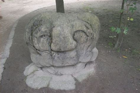 San Agustin statue in bad condition.