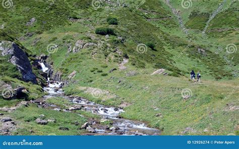 Hiking in the Alps stock photo. Image of hiking, persons - 12926274