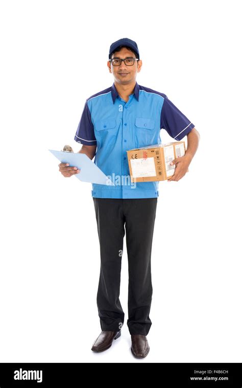 indian delivery man in blue uniform Stock Photo - Alamy