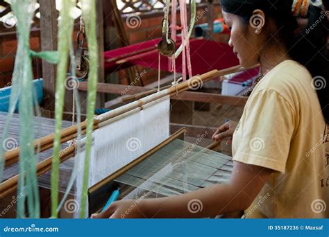 A Weaver Adjusts the Silk Cloth on Her Loom Editorial Photo - Image of ...