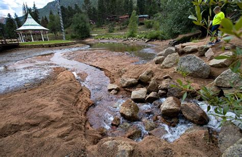 Water levels plummet in Green Mountain Falls lake after outlet breach | Colorado Springs News ...