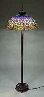 The 22" Dragonfly Tiffany laded glass lamp on a Bronze Junior floor base