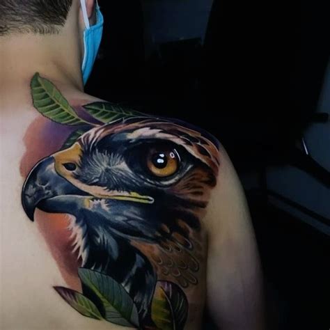 Realistic eagle tattoo on the shoulder blade