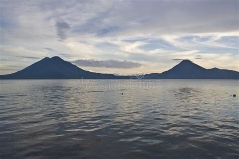 Volcanoes Overlooking Lake Atitlan Stock Photo - Image of light ...