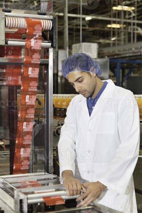 Bottling plant and machinery 942155 Stock Photo at Vecteezy