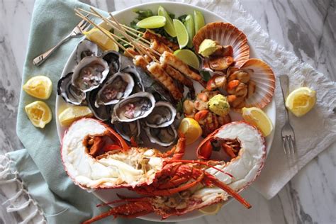 Seafood platter with fresh lobster, oysters, charred lime prawns and grilled scallops - Recipe ...