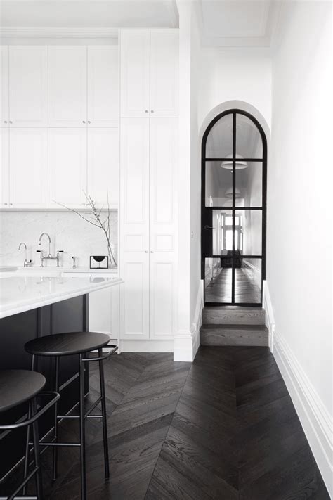 Behind an elegant Victorian facade in Prahran, this chic renovation creates a refined living s ...