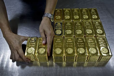 Gold Prices Weighed Down by Stronger Dollar, Fed Worries - WSJ