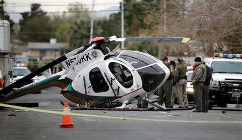 2 officers hurt in police helicopter crash near downtown Vegas | CTV News