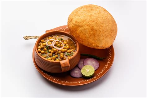 Chole bhature is a North Indian food dish. A combination of chana masala and bhatura or puri ...