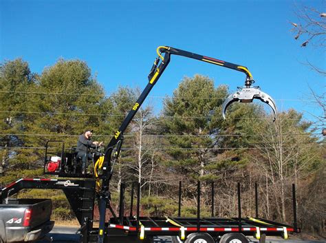 Logging Trailers with boom and grapple