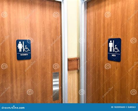 Public Restroom Doors for Male and Female with Blue Signs Stock Image - Image of bathroom, brown ...