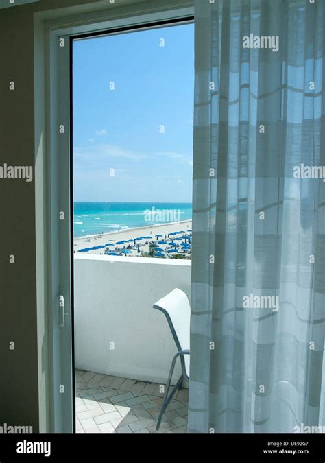 View from Hotel Room to Balcony Ovelooking Ocean Beach Stock Photo - Alamy