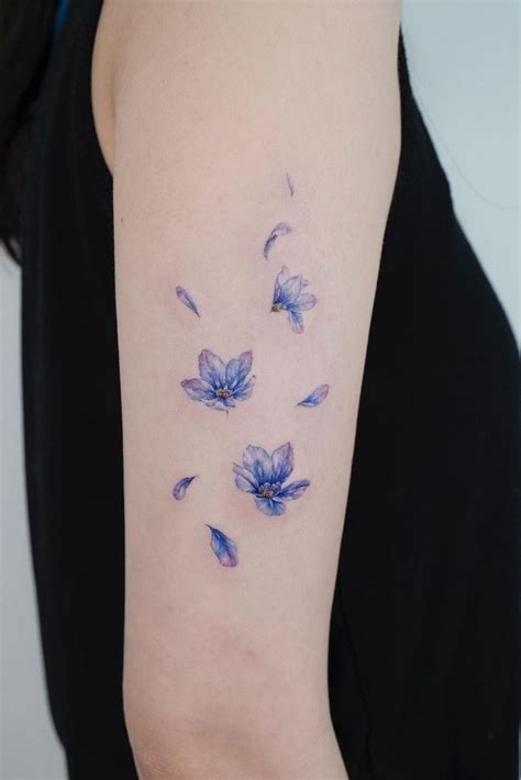 Small Blue Flowers Tattoo – InkStyleMag