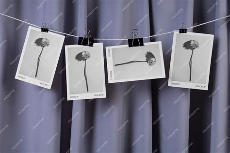 Premium PSD | Photographs hanging from clothes line