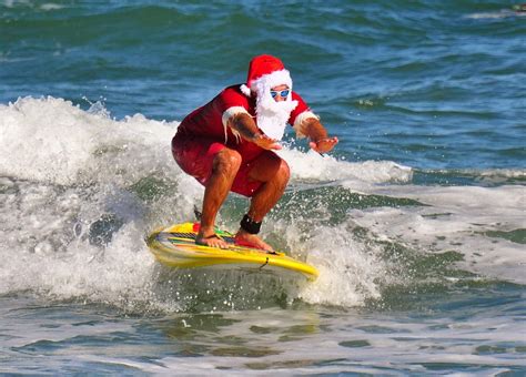 Surfing Santas Invading Cocoa Beach | WFIT