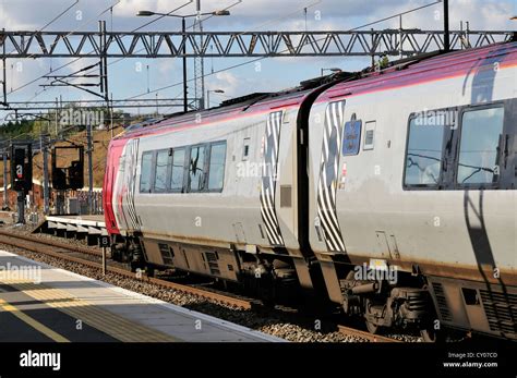 Virgin Voyager passenger train waiting at Milton Keynes station Stock ...