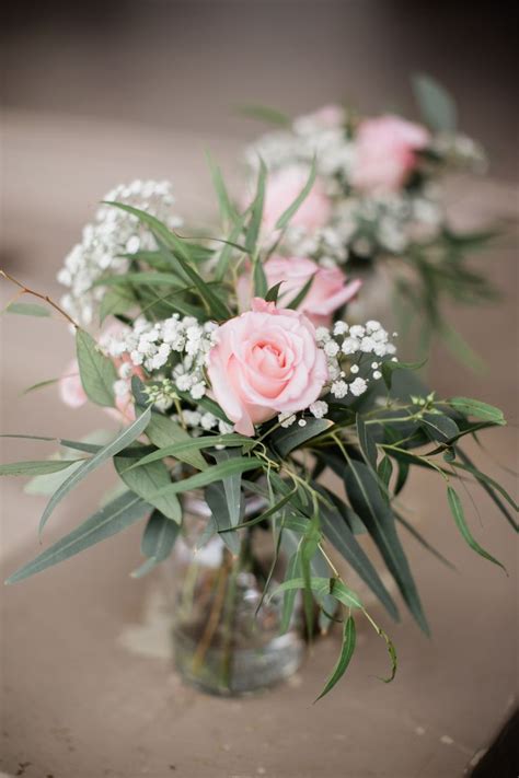 Simple Floral Centerpieces with Roses, Baby's Breath & Eucalyptus in ...