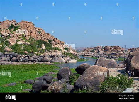 Tungabhadra river and rocky terrain. Hampi, Karnataka, India Stock ...