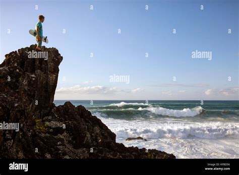 HAWAII, Oahu, North Shore, spectators watching the big swell waves rolling in on the North Shore ...