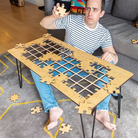 Jigsaw Puzzle Coffee Table™️ - Unnecessary Inventions