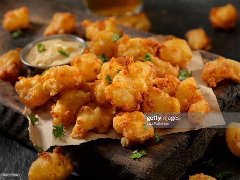 Beer Battered Cheese Curds with Sriracha Dipping Sauce | Doc's Bunkhouse