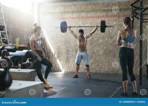 Sport. Crossfit Athletes at Workout Gym Stock Photo - Image of ...