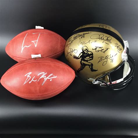 Heisman - 2 tickets to the trophy ceremony - 4 tickets to the gala - 3 signed items from former ...