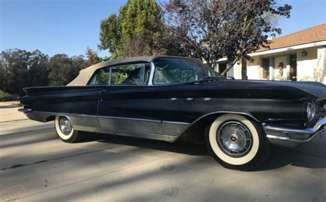 Black Plate 1960 Buick Electra 225 Convertible