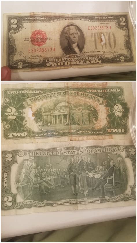 This 2 dollar bill from 1928 with red seal and numbers and different backside : r/mildlyinteresting