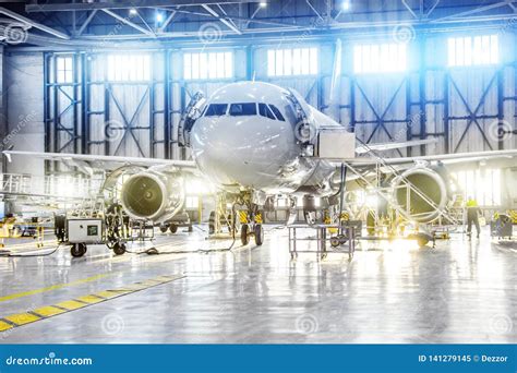 Aircraft on Maintenance of Engine and Fuselage Repair in Airport Hangar Stock Image - Image of ...