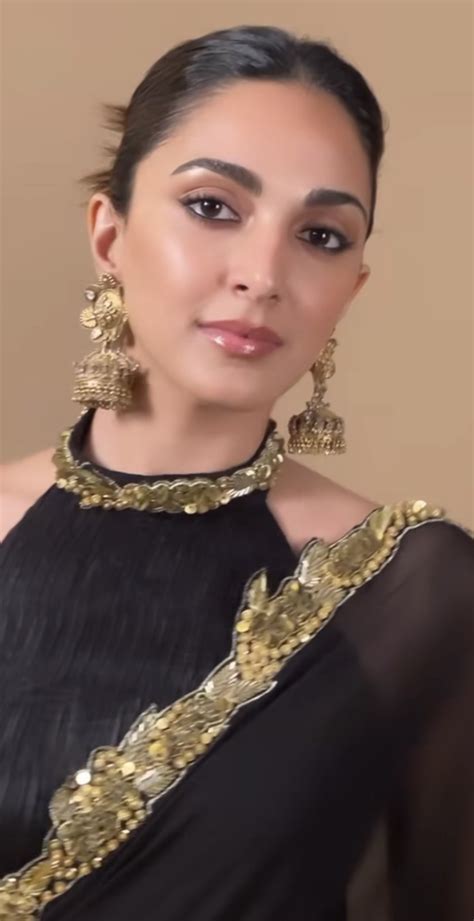 Kiara Advani is elegant as ever in a beautiful black and golden saree ...