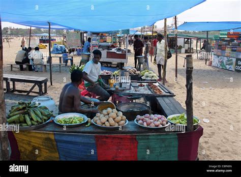 fresh fish fry and other food selling food stalls in marina Stock Photo ...