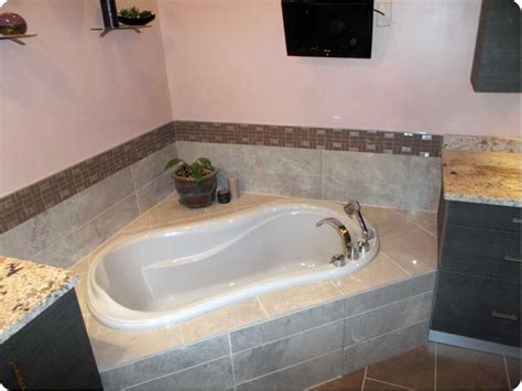 Imported Italian Tile bathroom surrounding a beautiful deep jacuzzi tub Jacuzzi Bathtub ...