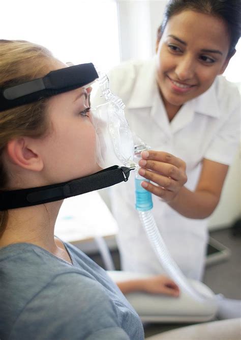 Adjusting Ventilator Mask Photograph by Science Photo Library