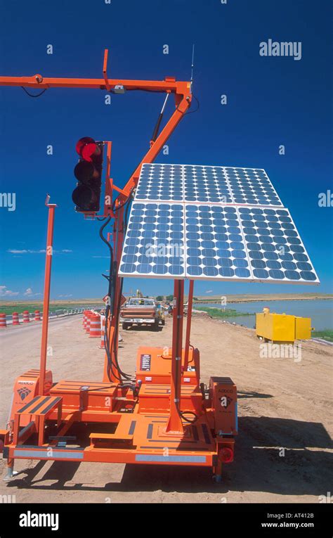 Solar powered portable traffic signal being used at a road construction ...