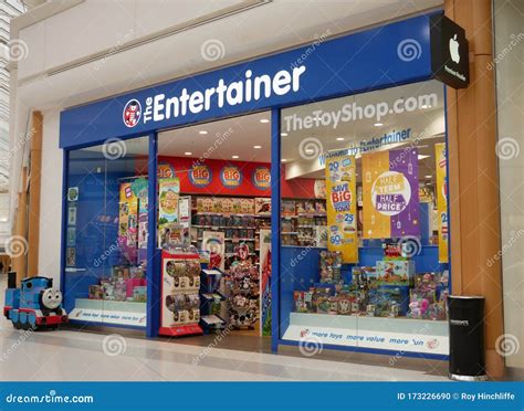 The Entertainer Toy Shop Front And Entrance With People Socially ...