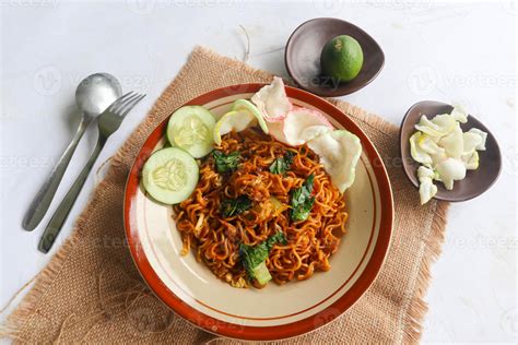 mie tek tek or fried noodle made with egg noodles with chicken, cabbage ...