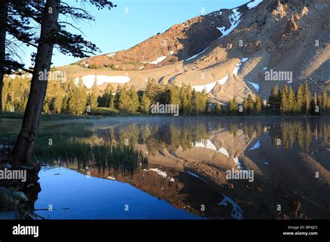 Sunrise at a mountain lake Stock Photo - Alamy